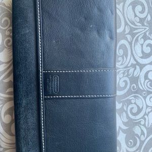 Coach bill fold wallet.  Heavily used